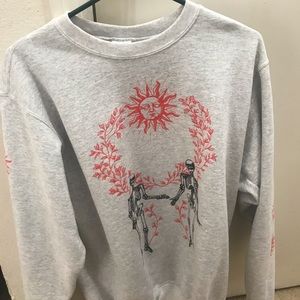 Skeleton and sun sweater